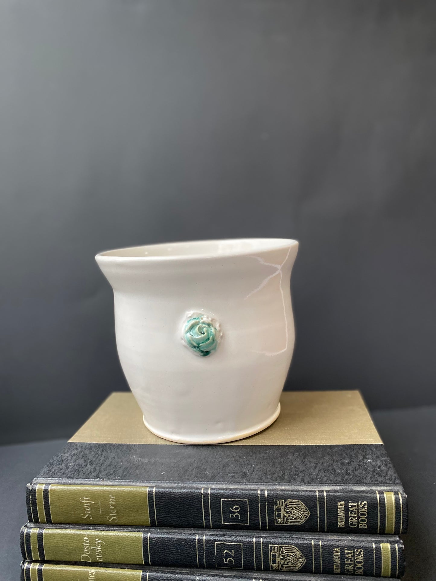 Wide mouth vase with decorative rose flower “handle” detail